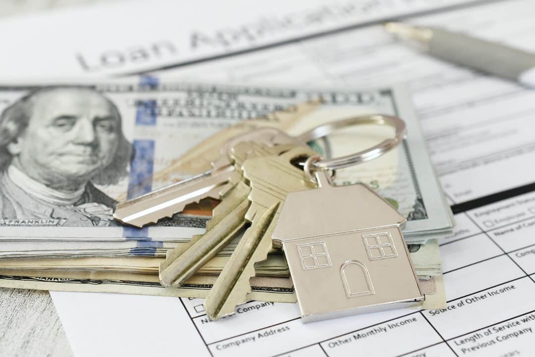 Dollars, house keys, and a loan application