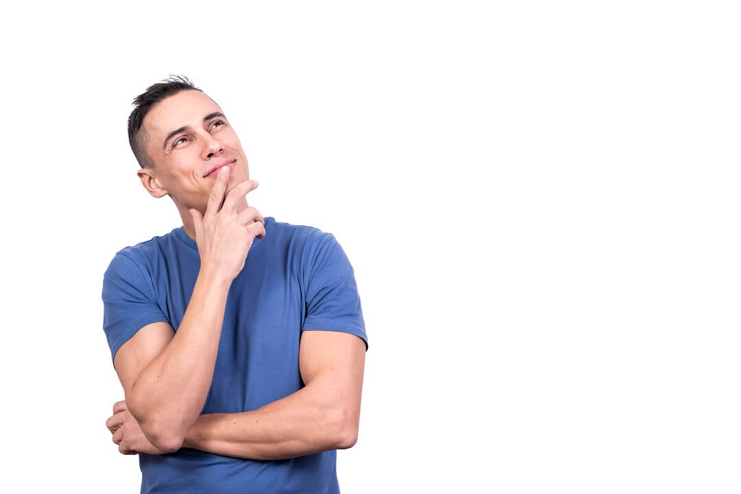 Man wearing blue shirt thinking