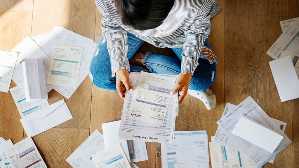 Woman sorting bank statements